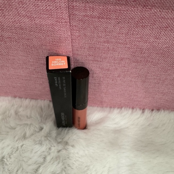 Laura Mercier
Lip Glacé Lip Gloss Color: 150 Melon Sorbet - light coral pink - Picture 1 of 10